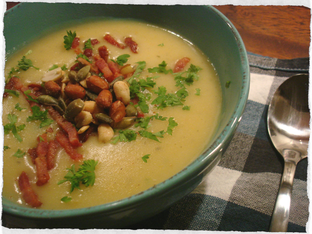 Potato soup with thyme, carrots and onions